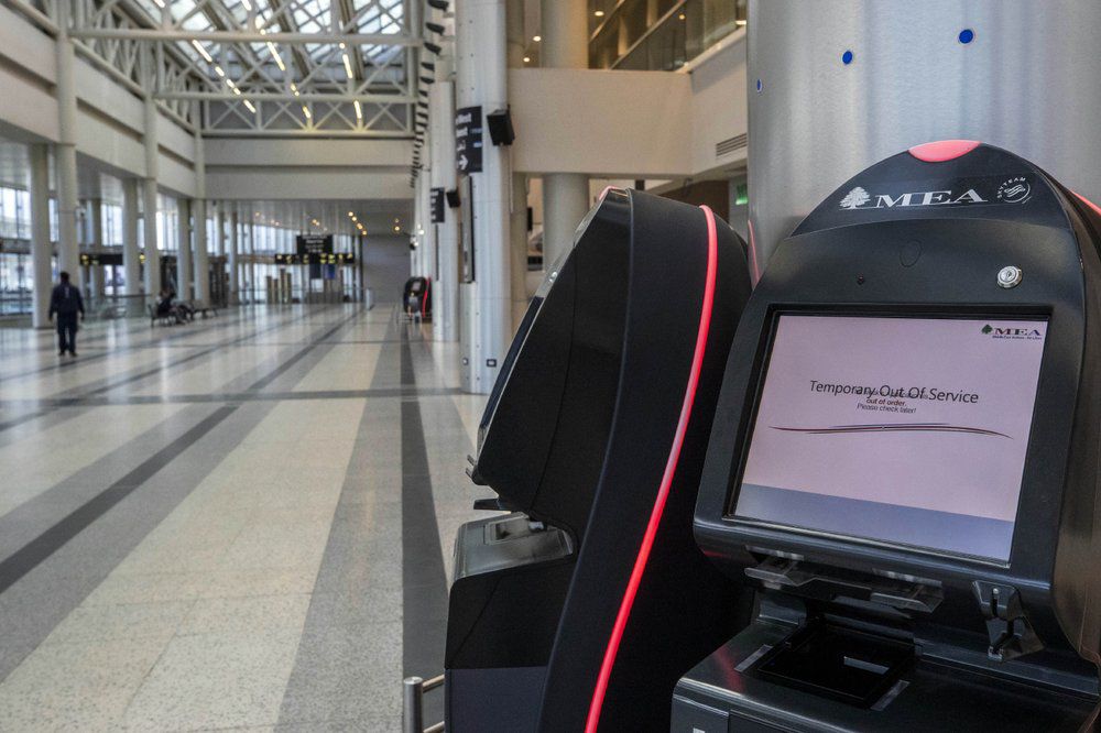 CORONAVIRUS - Check-in machine at empty departure area of Rafik Hariri International Airport